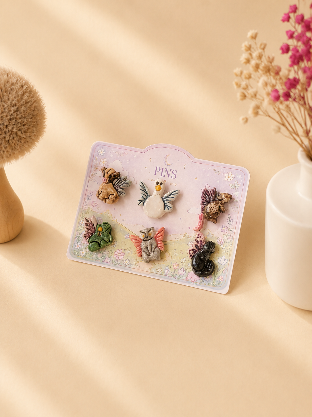 Pines, broches y colgantes
